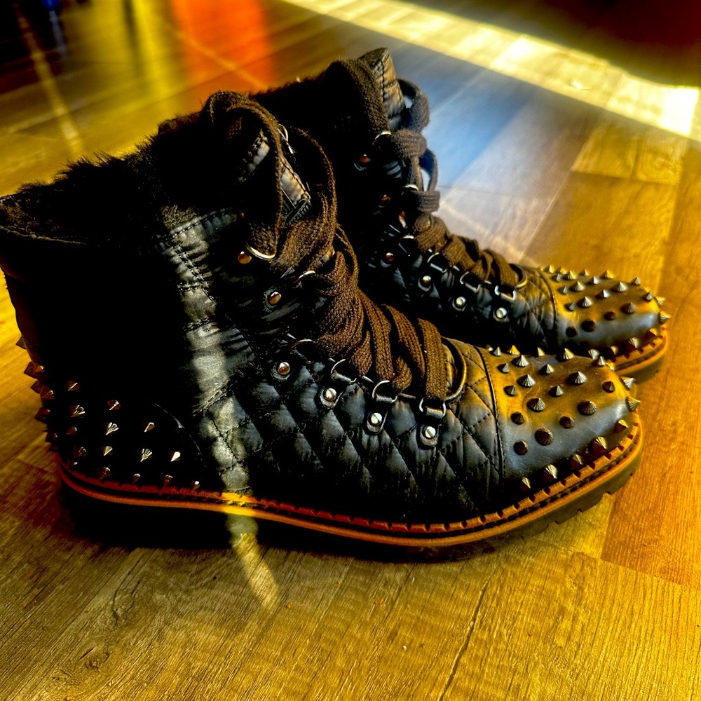 Studded black boots